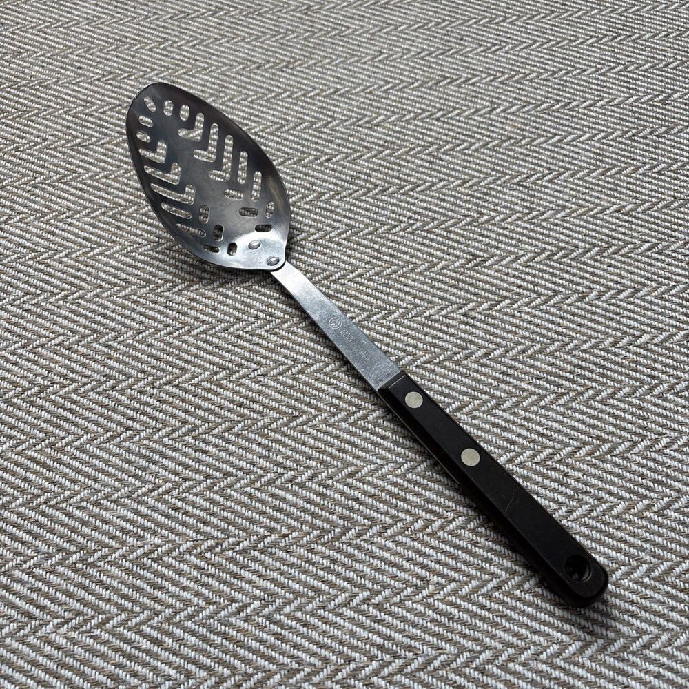 Vintage Montgomery Ward Stainless Steel Slotted Spoon 11.5” MW Hard Handle